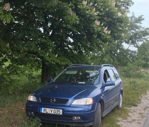 Синий Опель Астра, объемом двигателя 1.2 л и пробегом 200 тыс. км за 1500 $, фото 1 на Automoto.ua