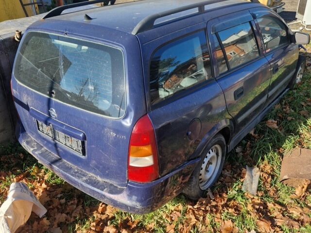 Синий Опель Астра, объемом двигателя 1.7 л и пробегом 220 тыс. км за 500 $, фото 1 на Automoto.ua