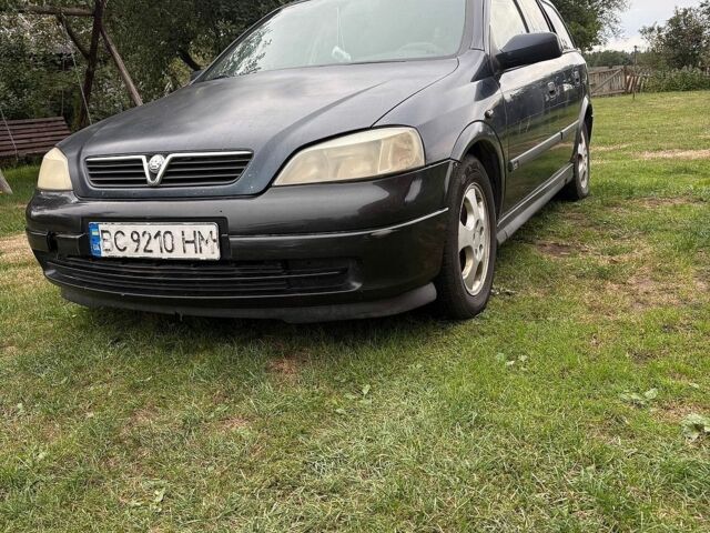 Синій Опель Астра, об'ємом двигуна 2 л та пробігом 450 тис. км за 2100 $, фото 1 на Automoto.ua