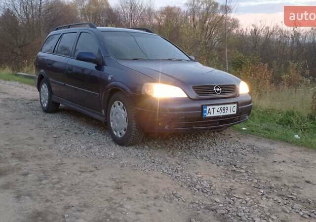 Синий Опель Астра, объемом двигателя 1.7 л и пробегом 350 тыс. км за 2300 $, фото 1 на Automoto.ua