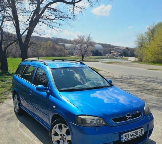Синий Опель Астра, объемом двигателя 2 л и пробегом 250 тыс. км за 4000 $, фото 1 на Automoto.ua