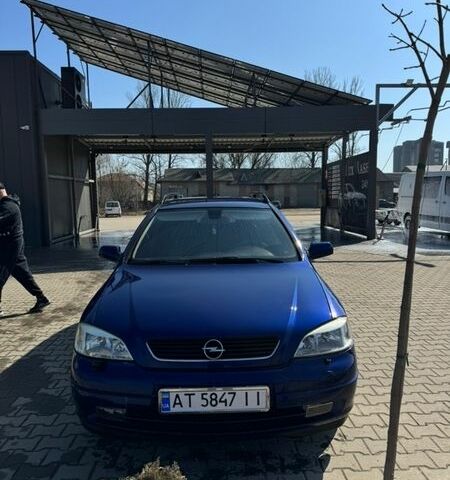 Синий Опель Астра, объемом двигателя 1.8 л и пробегом 321 тыс. км за 2400 $, фото 1 на Automoto.ua