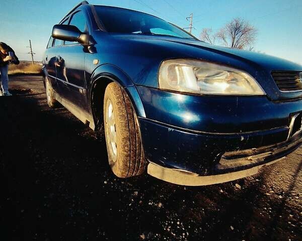 Синий Опель Астра, объемом двигателя 2 л и пробегом 369 тыс. км за 3300 $, фото 1 на Automoto.ua