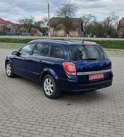 Синій Опель Астра, об'ємом двигуна 0 л та пробігом 241 тис. км за 4250 $, фото 1 на Automoto.ua