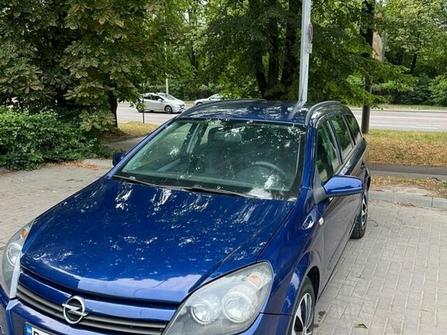 Синий Опель Астра, объемом двигателя 1.6 л и пробегом 244 тыс. км за 3500 $, фото 1 на Automoto.ua