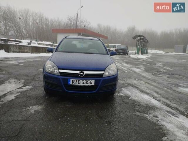 Синий Опель Астра, объемом двигателя 1.6 л и пробегом 223 тыс. км за 4999 $, фото 1 на Automoto.ua