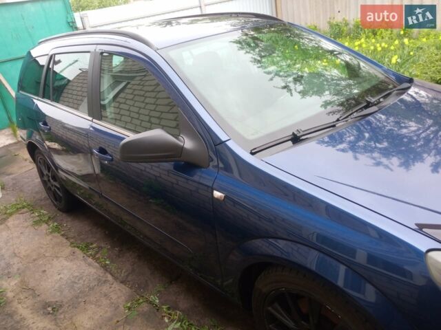 Синий Опель Астра, объемом двигателя 2 л и пробегом 277 тыс. км за 4500 $, фото 1 на Automoto.ua