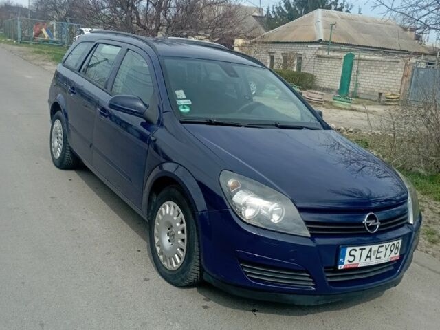 Синий Опель Астра, объемом двигателя 1.7 л и пробегом 200 тыс. км за 2500 $, фото 1 на Automoto.ua