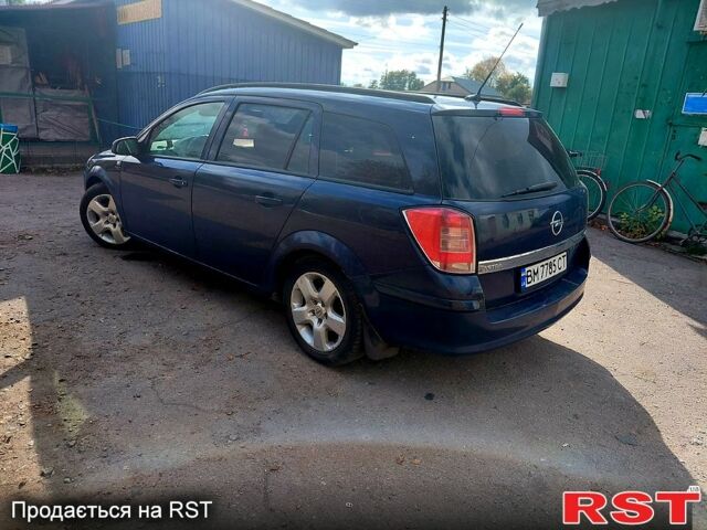 Синий Опель Астра, объемом двигателя 1.2 л и пробегом 330 тыс. км за 4200 $, фото 1 на Automoto.ua