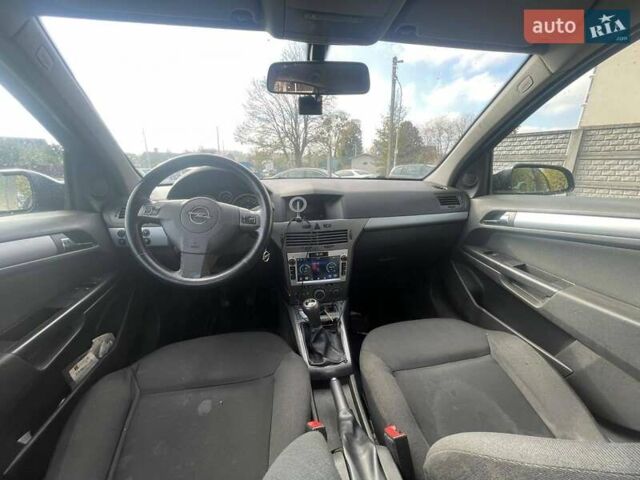 Синий Опель Астра, объемом двигателя 1.2 л и пробегом 338 тыс. км за 3800 $, фото 1 на Automoto.ua