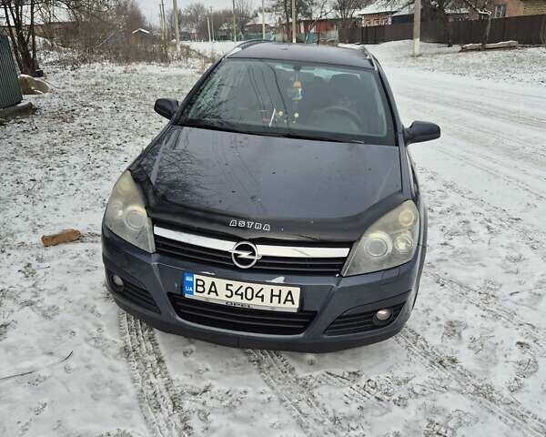 Синий Опель Астра, объемом двигателя 2 л и пробегом 274 тыс. км за 4600 $, фото 1 на Automoto.ua