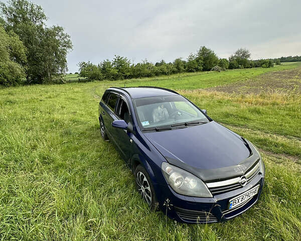 Синий Опель Астра, объемом двигателя 1.69 л и пробегом 330 тыс. км за 3900 $, фото 1 на Automoto.ua