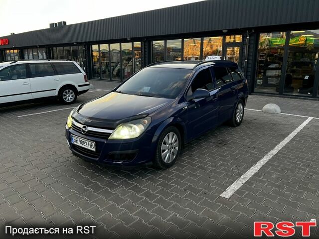 Синий Опель Астра, объемом двигателя 1.9 л и пробегом 320 тыс. км за 5000 $, фото 1 на Automoto.ua