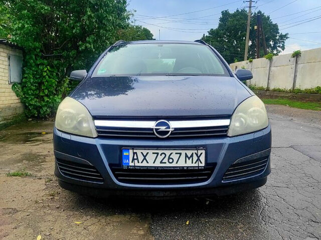 Синий Опель Астра, объемом двигателя 1.4 л и пробегом 375 тыс. км за 4100 $, фото 1 на Automoto.ua