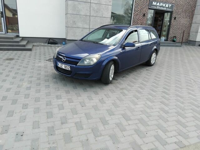 Синий Опель Астра, объемом двигателя 1.7 л и пробегом 300 тыс. км за 1750 $, фото 1 на Automoto.ua