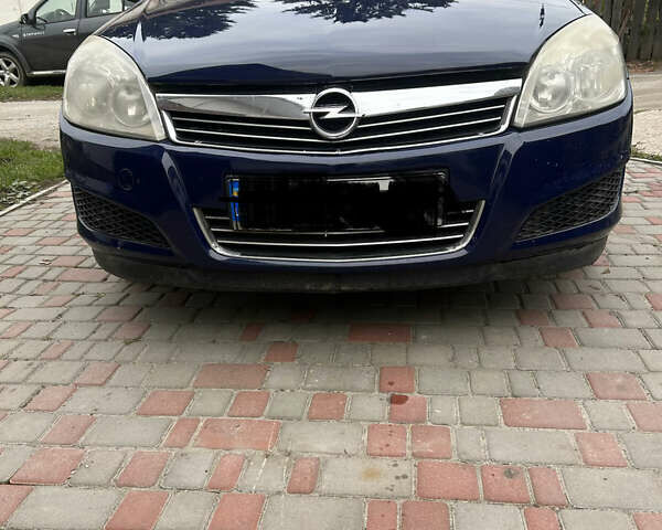Синий Опель Астра, объемом двигателя 1.6 л и пробегом 343 тыс. км за 4500 $, фото 1 на Automoto.ua