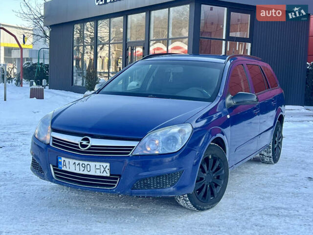 Синий Опель Астра, объемом двигателя 1.69 л и пробегом 350 тыс. км за 3999 $, фото 1 на Automoto.ua