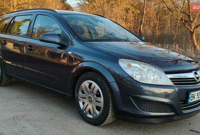 Синий Опель Астра, объемом двигателя 1.69 л и пробегом 244 тыс. км за 5500 $, фото 1 на Automoto.ua