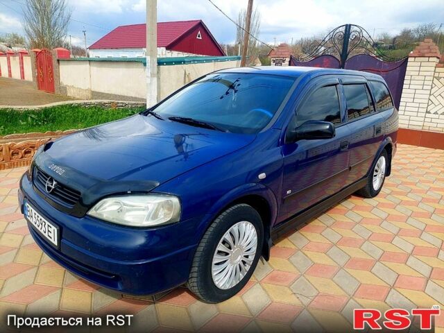 Синий Опель Астра, объемом двигателя 1.7 л и пробегом 302 тыс. км за 3350 $, фото 1 на Automoto.ua