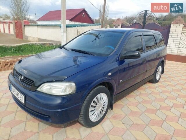 Синий Опель Астра, объемом двигателя 1.69 л и пробегом 302 тыс. км за 3350 $, фото 1 на Automoto.ua