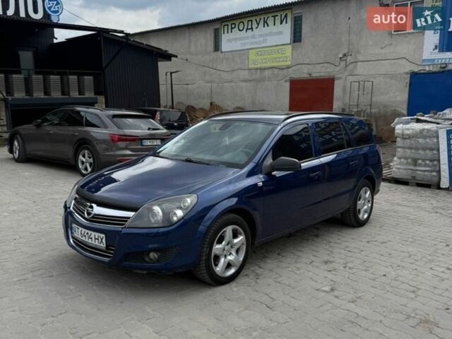 Синий Опель Астра, объемом двигателя 1.69 л и пробегом 255 тыс. км за 4200 $, фото 1 на Automoto.ua