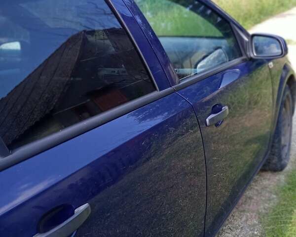 Синий Опель Астра, объемом двигателя 1.69 л и пробегом 230 тыс. км за 4700 $, фото 1 на Automoto.ua