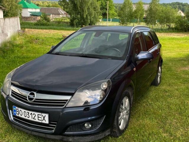 Синий Опель Астра, объемом двигателя 1.69 л и пробегом 215 тыс. км за 5550 $, фото 1 на Automoto.ua