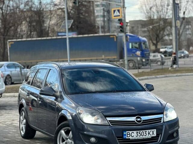 Синий Опель Астра, объемом двигателя 1.69 л и пробегом 250 тыс. км за 6000 $, фото 1 на Automoto.ua