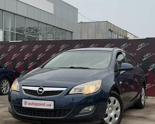 Синий Опель Астра, объемом двигателя 1.25 л и пробегом 214 тыс. км за 6500 $, фото 1 на Automoto.ua