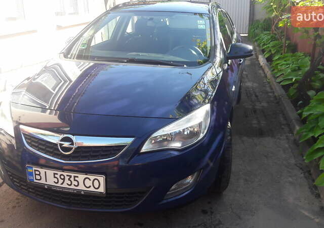Синий Опель Астра, объемом двигателя 1.2 л и пробегом 203 тыс. км за 7500 $, фото 1 на Automoto.ua