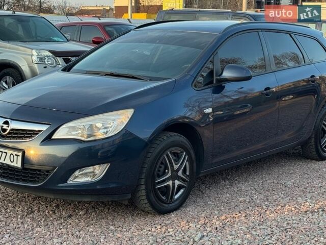 Синий Опель Астра, объемом двигателя 1.25 л и пробегом 287 тыс. км за 6999 $, фото 1 на Automoto.ua