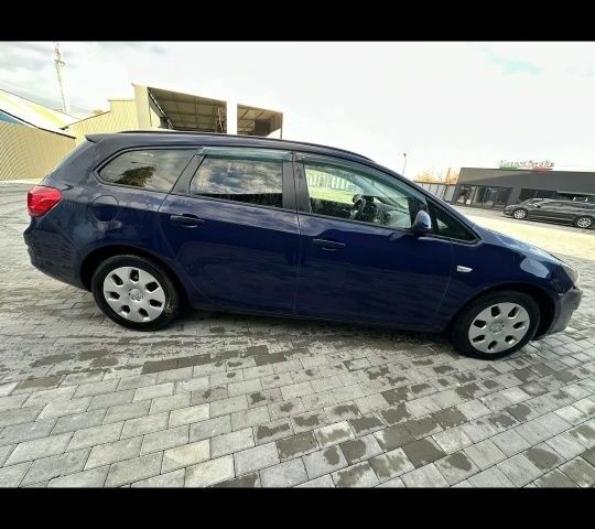 Синій Опель Астра, об'ємом двигуна 0 л та пробігом 124 тис. км за 6200 $, фото 1 на Automoto.ua