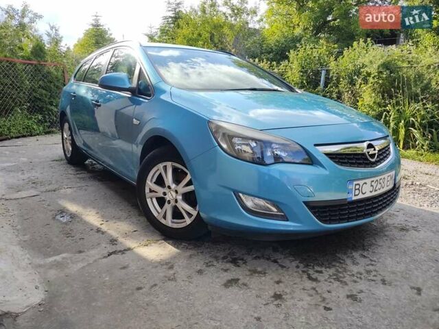 Синий Опель Астра, объемом двигателя 1.25 л и пробегом 225 тыс. км за 8700 $, фото 1 на Automoto.ua