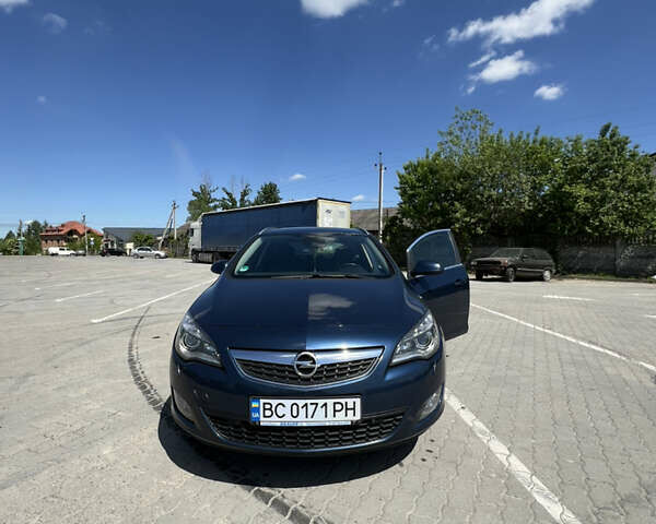 Синий Опель Астра, объемом двигателя 2 л и пробегом 240 тыс. км за 7000 $, фото 1 на Automoto.ua