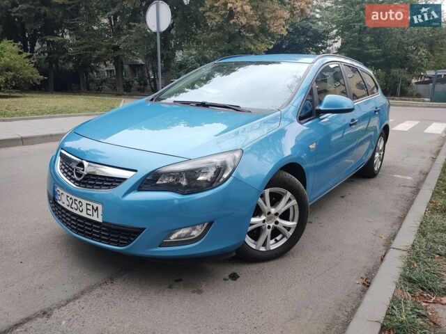 Синий Опель Астра, объемом двигателя 1.2 л и пробегом 227 тыс. км за 6450 $, фото 1 на Automoto.ua