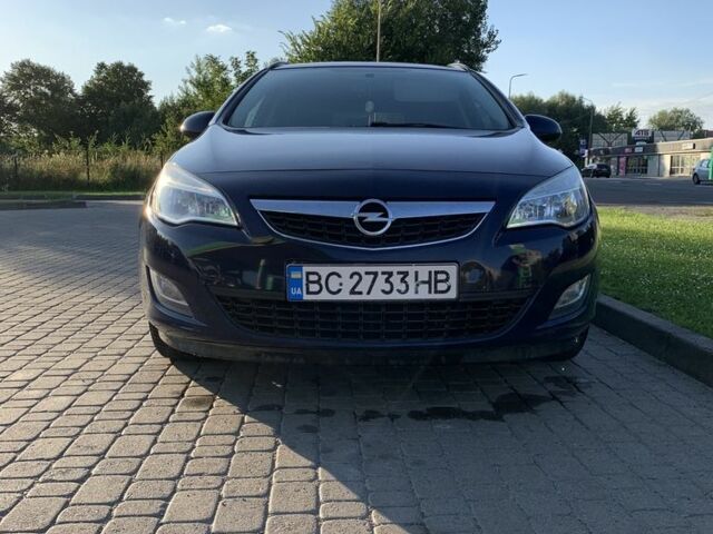 Синий Опель Астра, объемом двигателя 1.2 л и пробегом 203 тыс. км за 7000 $, фото 1 на Automoto.ua