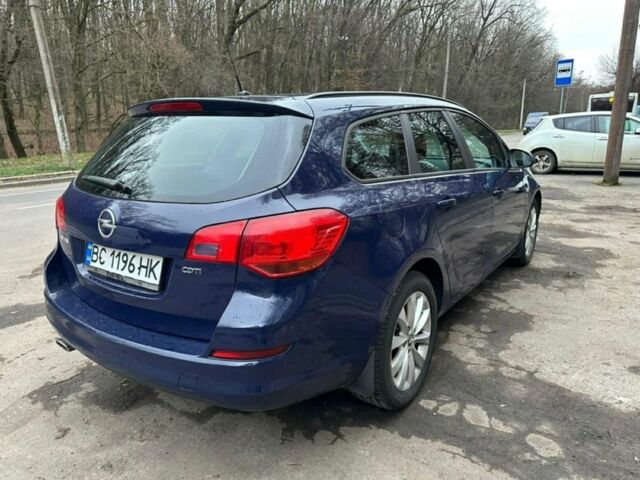 Синий Опель Астра, объемом двигателя 2 л и пробегом 278 тыс. км за 6350 $, фото 1 на Automoto.ua