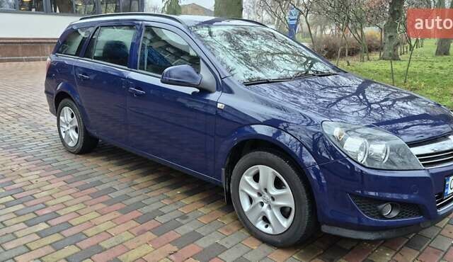Синій Опель Астра, об'ємом двигуна 1.4 л та пробігом 30 тис. км за 7500 $, фото 1 на Automoto.ua