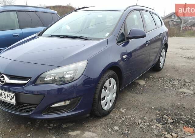 Синий Опель Астра, объемом двигателя 1.69 л и пробегом 225 тыс. км за 7300 $, фото 1 на Automoto.ua