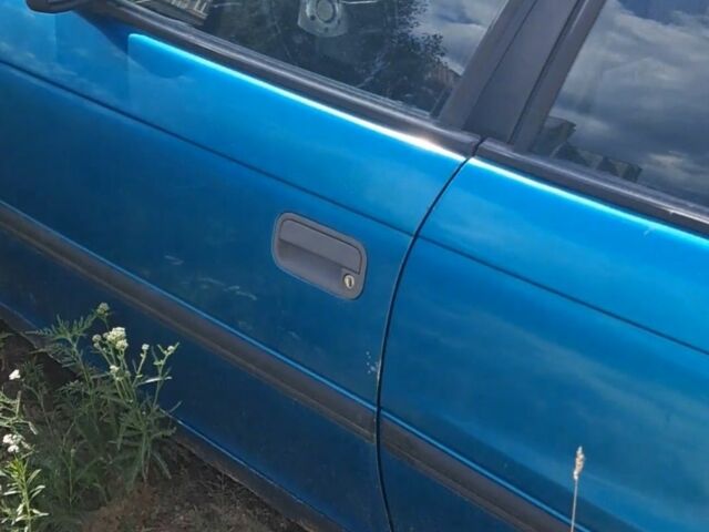 Зеленый Опель Астра, объемом двигателя 1 л и пробегом 300 тыс. км за 488 $, фото 1 на Automoto.ua