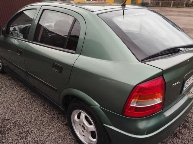 Зеленый Опель Астра, объемом двигателя 1.4 л и пробегом 250 тыс. км за 2450 $, фото 1 на Automoto.ua