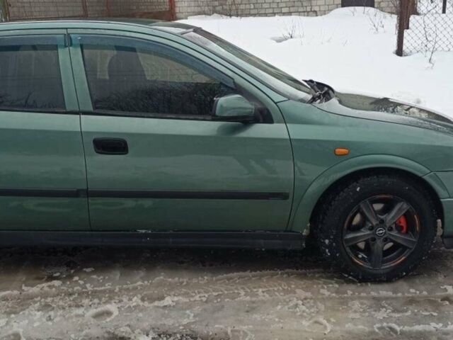 Зелений Опель Астра, об'ємом двигуна 2 л та пробігом 222 тис. км за 3100 $, фото 1 на Automoto.ua