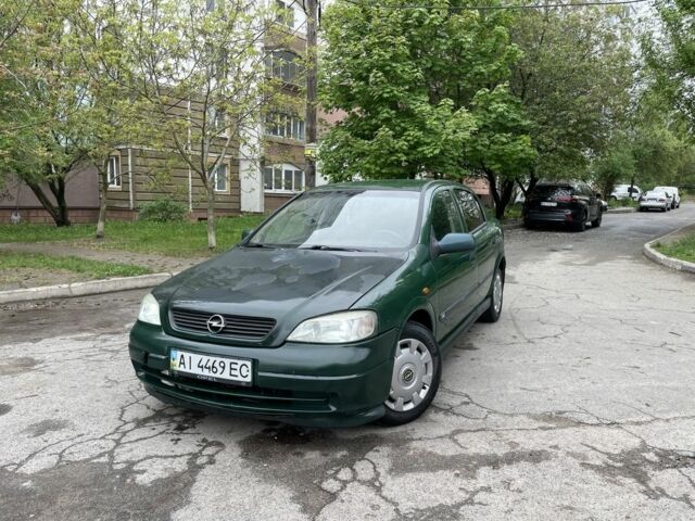 Зеленый Опель Астра, объемом двигателя 1.4 л и пробегом 290 тыс. км за 2450 $, фото 1 на Automoto.ua
