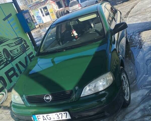Зеленый Опель Астра, объемом двигателя 1.4 л и пробегом 260 тыс. км за 1558 $, фото 1 на Automoto.ua
