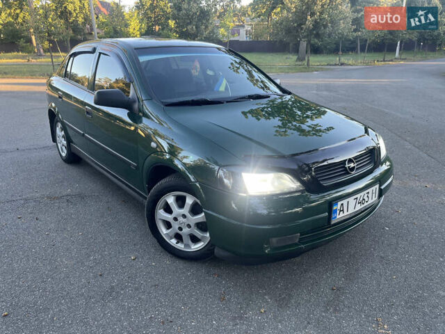 Зеленый Опель Астра, объемом двигателя 1.2 л и пробегом 258 тыс. км за 3500 $, фото 1 на Automoto.ua