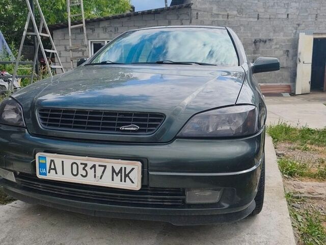 Зелений Опель Астра, об'ємом двигуна 1.6 л та пробігом 249 тис. км за 3600 $, фото 1 на Automoto.ua