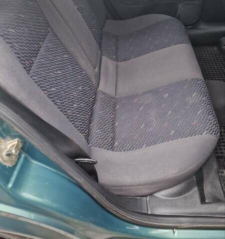 Зеленый Опель Астра, объемом двигателя 1.6 л и пробегом 200 тыс. км за 4000 $, фото 1 на Automoto.ua