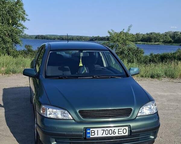 Зеленый Опель Астра, объемом двигателя 1.6 л и пробегом 303 тыс. км за 3399 $, фото 1 на Automoto.ua