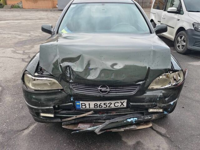Зеленый Опель Астра, объемом двигателя 1.6 л и пробегом 300 тыс. км за 1100 $, фото 1 на Automoto.ua