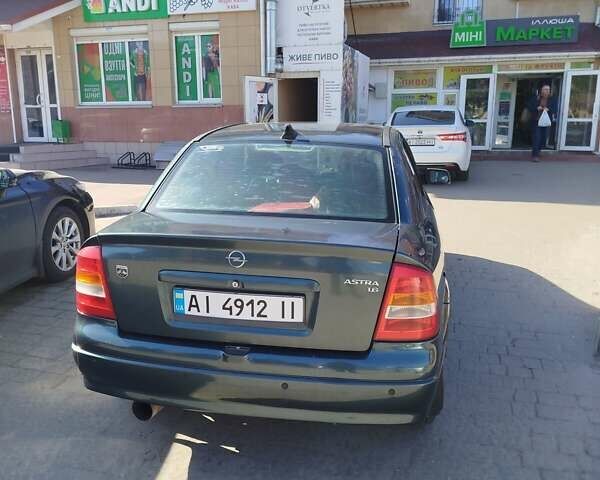 Зеленый Опель Астра, объемом двигателя 1.6 л и пробегом 350 тыс. км за 2850 $, фото 1 на Automoto.ua